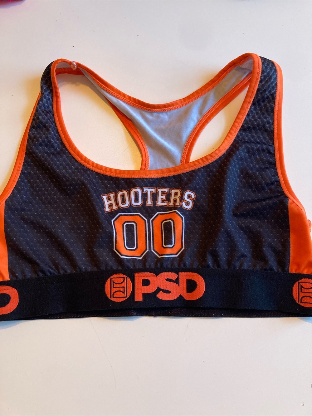 PSD Black and Orange Hooters Number 00 Sports Crop